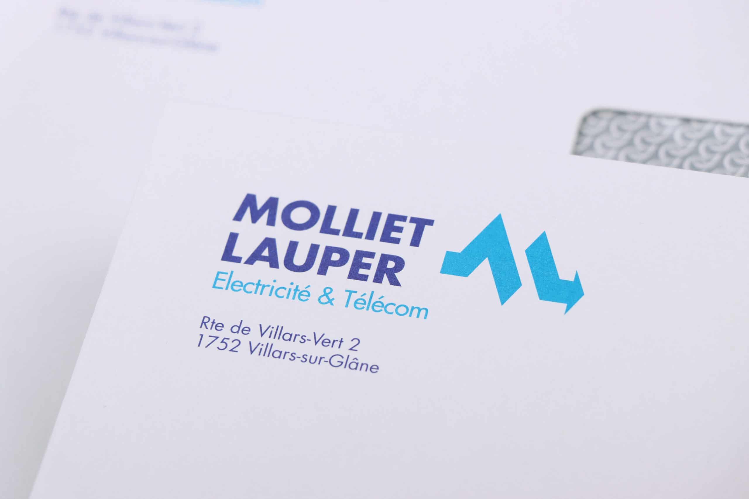 Logo Molliet Lauper en en-tête d'enveloppes C5.