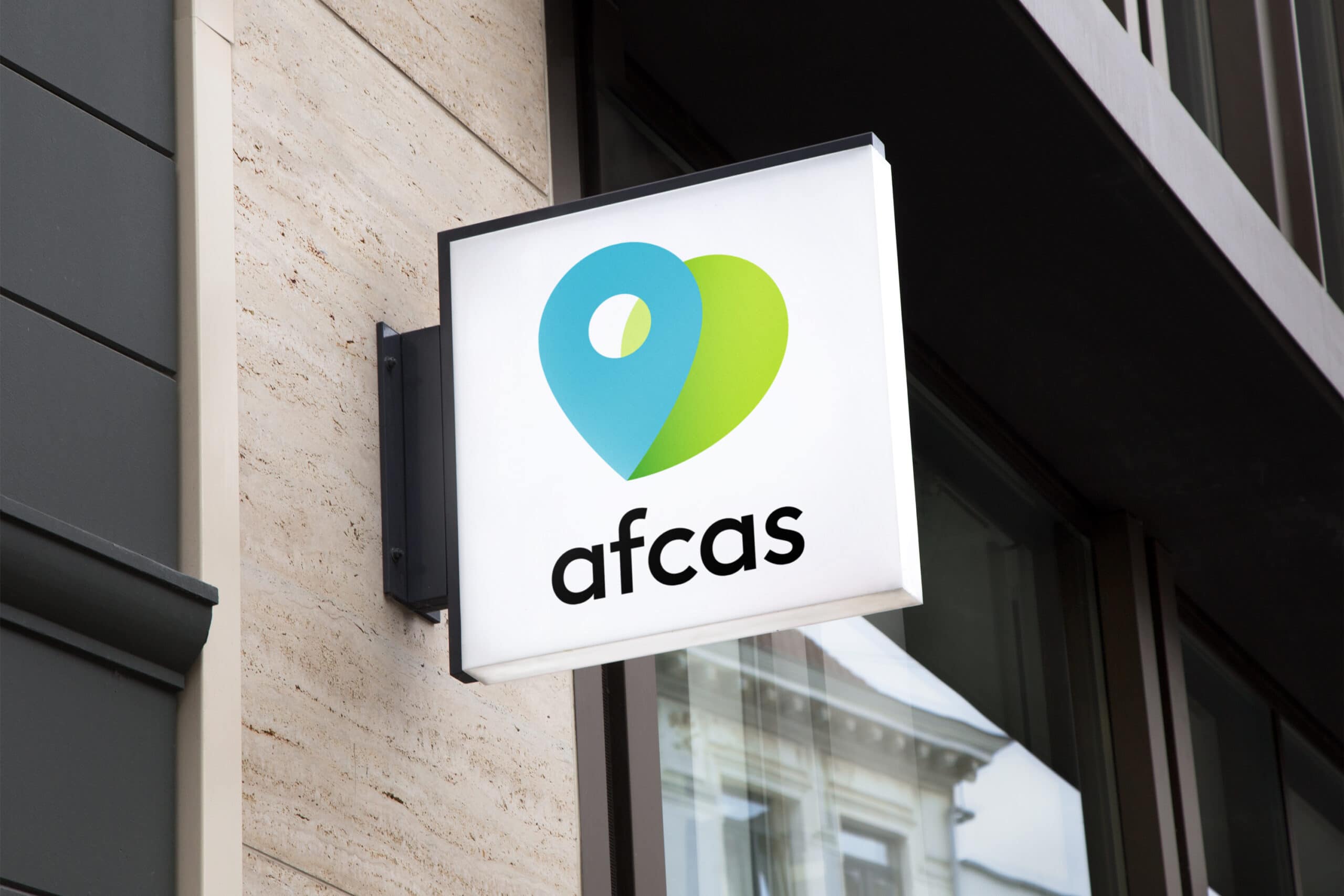 Enseigne lumineuse avec le logo AFCAS (montage).